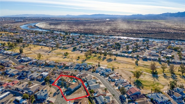 bird's eye view with a residential view and a water and mountain view