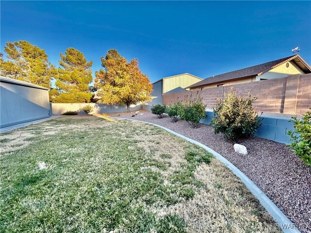 view of yard featuring a fenced backyard