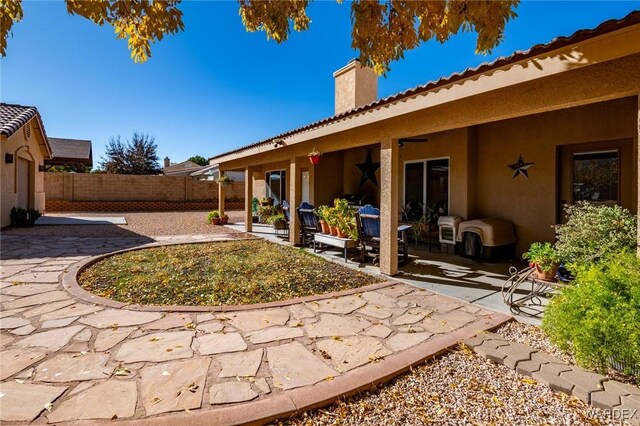 view of yard with a fenced backyard and a patio