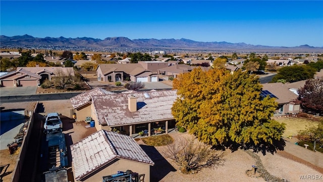 drone / aerial view with a mountain view and a residential view