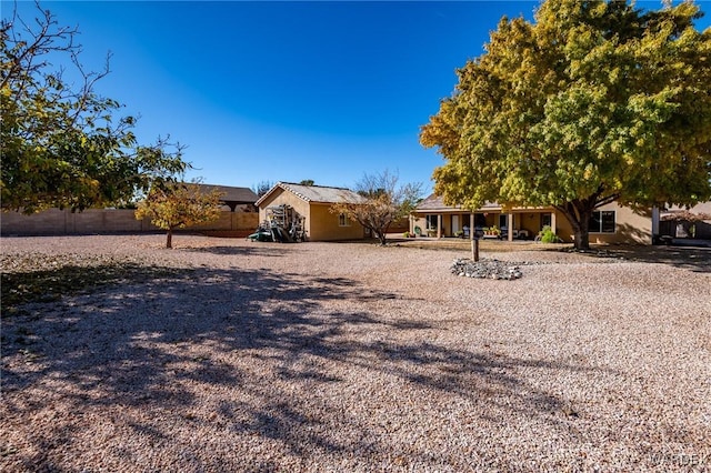 view of front of home with fence