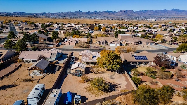 drone / aerial view with a residential view and a mountain view