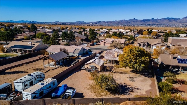 birds eye view of property with a residential view and a mountain view