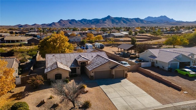 bird's eye view featuring a residential view and a mountain view