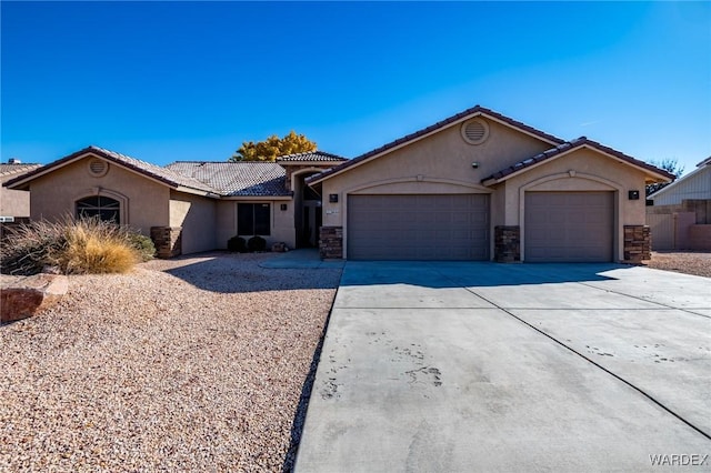 single story home featuring stone siding, concrete driveway, an attached garage, and stucco siding