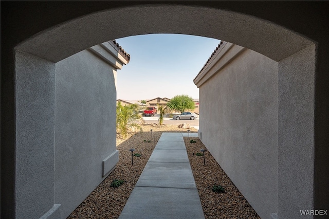 view of side of property featuring stucco siding