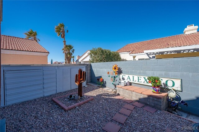 view of yard with fence