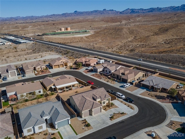 aerial view featuring a residential view and a mountain view