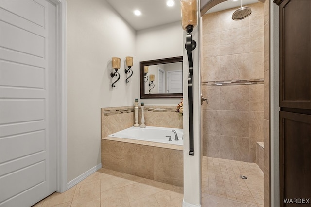 full bathroom with tile patterned flooring, a garden tub, and a tile shower