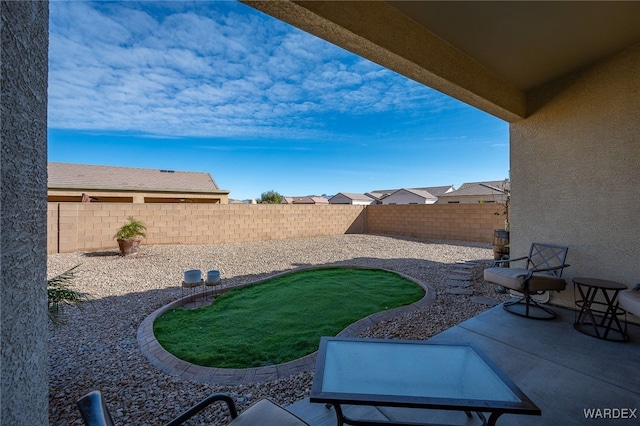 view of patio with a fenced backyard