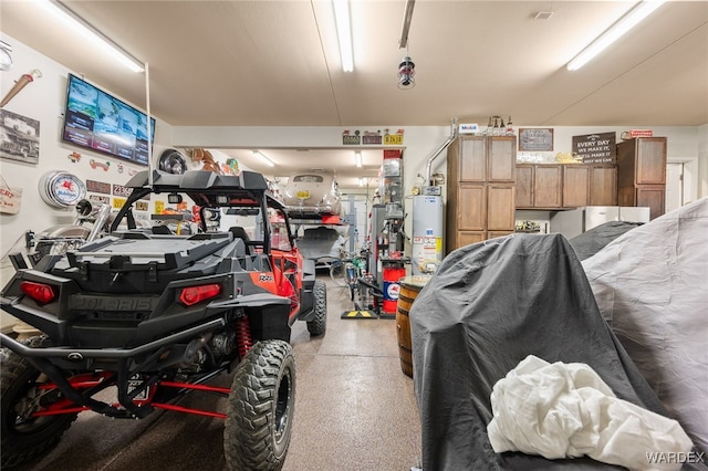 garage featuring water heater