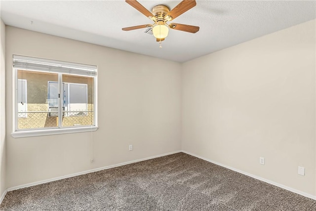 1951 E Oatman Pl, Mohave Valley, AZ 86440 - carpeted empty room with a ceiling fan and baseboards