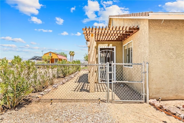 1951 E Oatman Pl, Mohave Valley, AZ 86440 - view of yard featuring a gate and a pergola