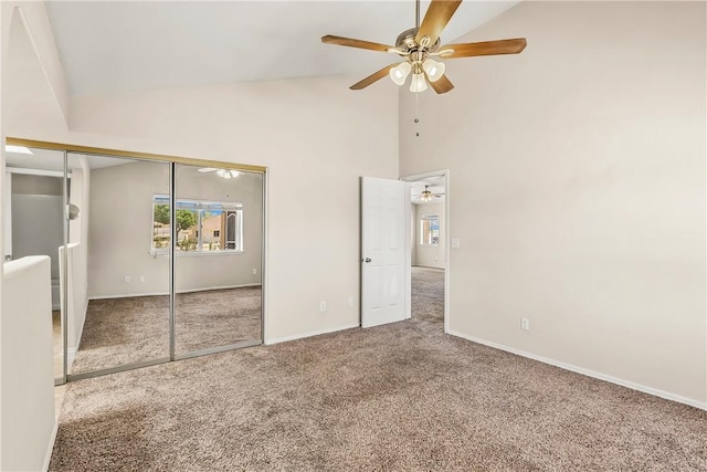 1951 E Oatman Pl, Mohave Valley, AZ 86440 - unfurnished bedroom featuring carpet floors, high vaulted ceiling, a closet, and ceiling fan