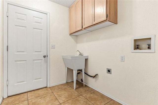 1951 E Oatman Pl, Mohave Valley, AZ 86440 - washroom with hookup for an electric dryer, cabinet space, light tile patterned floors, and hookup for a washing machine