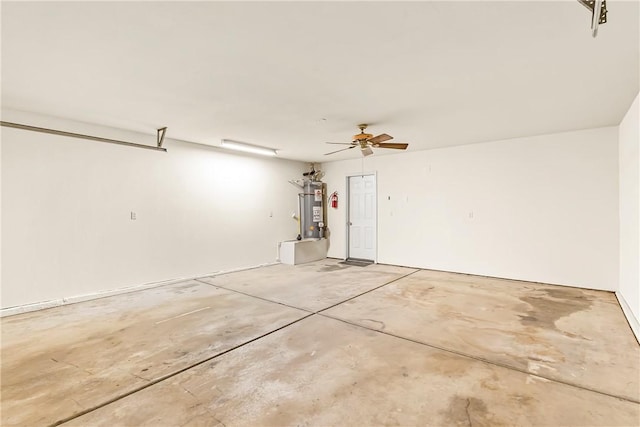 1951 E Oatman Pl, Mohave Valley, AZ 86440 - garage with water heater and ceiling fan