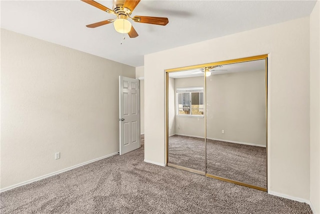 1951 E Oatman Pl, Mohave Valley, AZ 86440 - unfurnished bedroom featuring carpet flooring, a closet, and ceiling fan