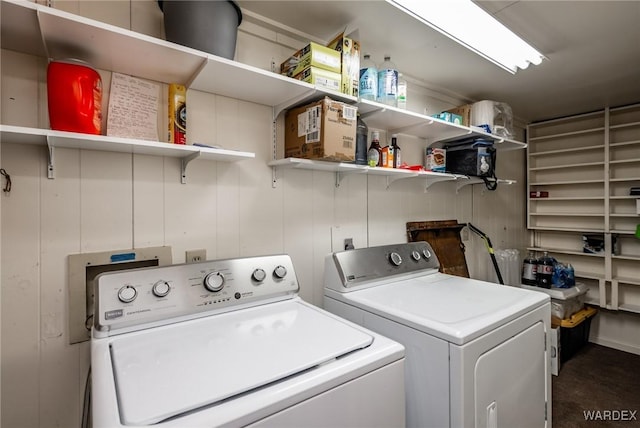 laundry area featuring washing machine and dryer and laundry area