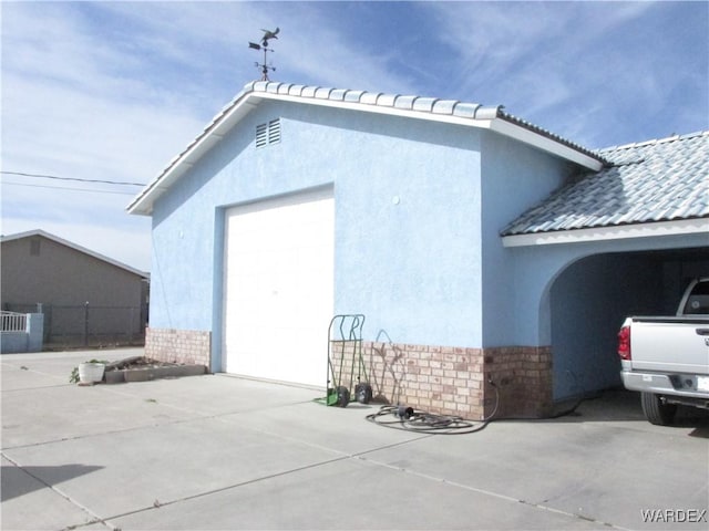 garage with driveway