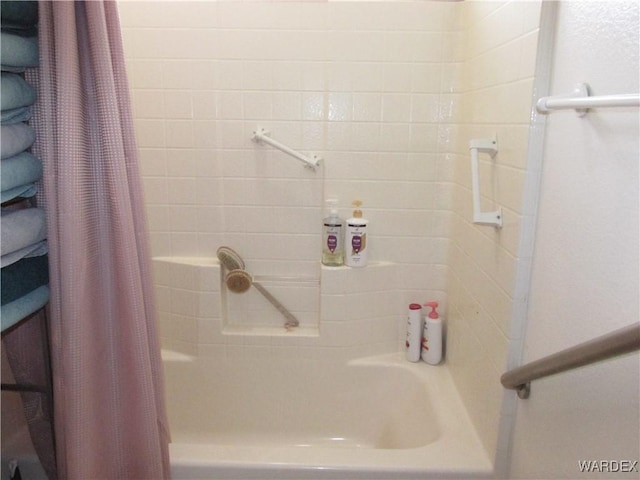 bathroom featuring shower / bath combination with curtain