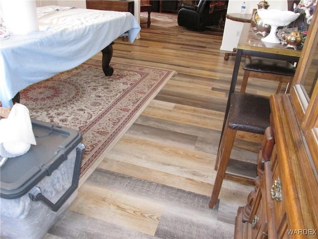 bedroom featuring wood finished floors