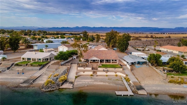 bird's eye view featuring a water and mountain view