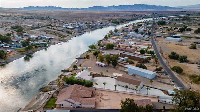 bird's eye view featuring a residential view and a water and mountain view