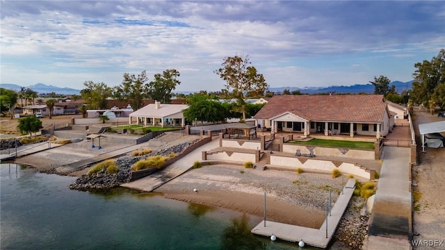 bird's eye view featuring a water and mountain view