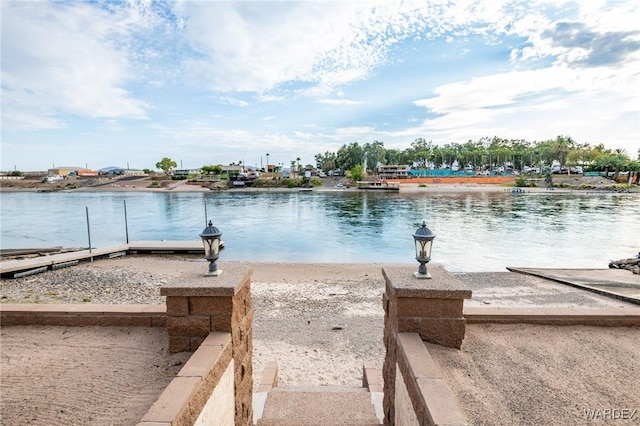 view of dock with a water view