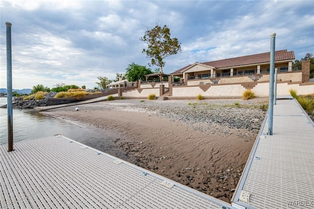 exterior space with a water view