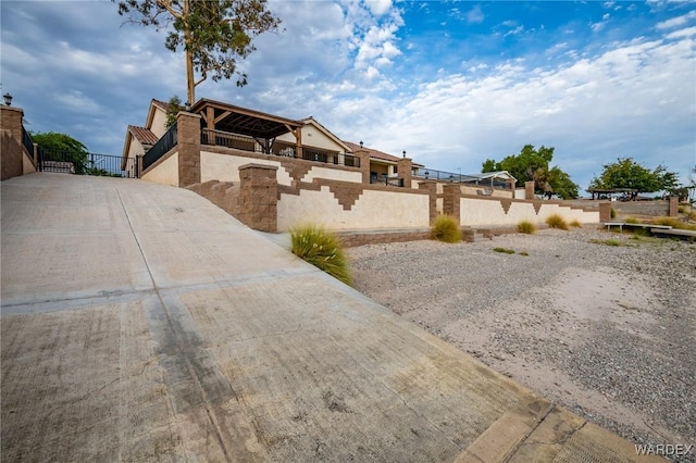 view of front of home with fence