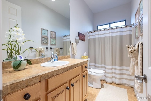 full bathroom with vanity, toilet, and a shower with curtain