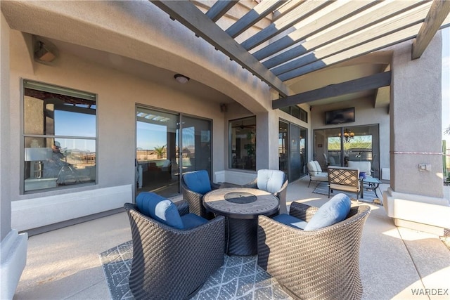 view of patio with an outdoor hangout area and a pergola