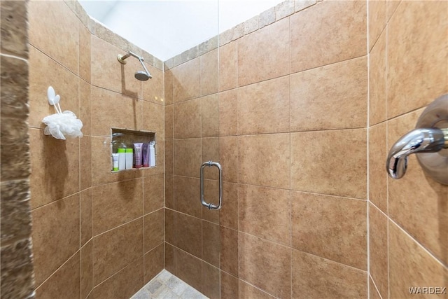 full bath with a shower stall