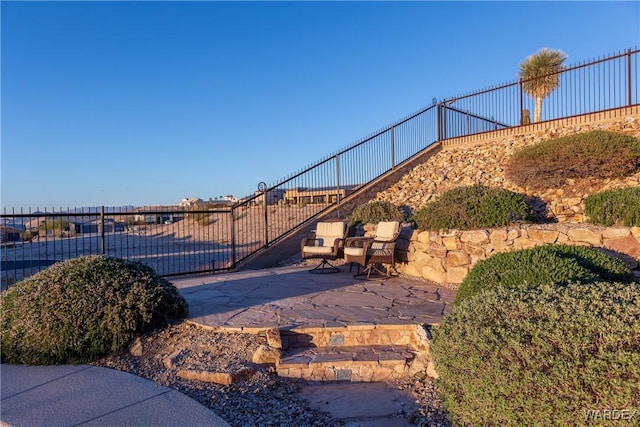 surrounding community with fence and a patio