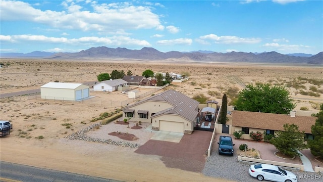 bird's eye view with a rural view, a desert view, and a mountain view