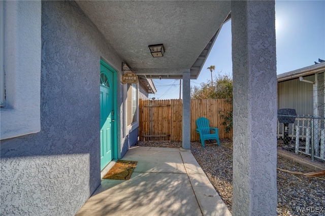 view of patio / terrace with fence