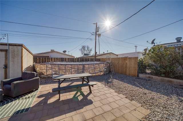 view of patio with a fenced backyard