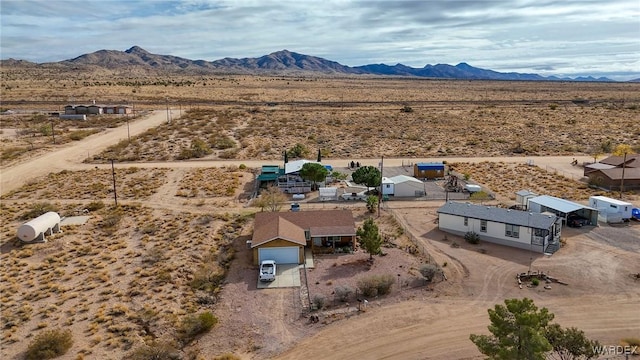 aerial view with a mountain view and view of desert