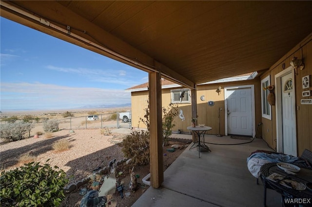 view of patio / terrace with fence