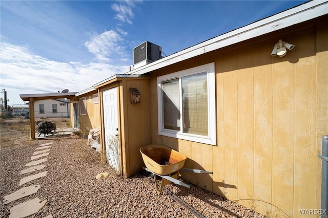 view of home's exterior featuring cooling unit