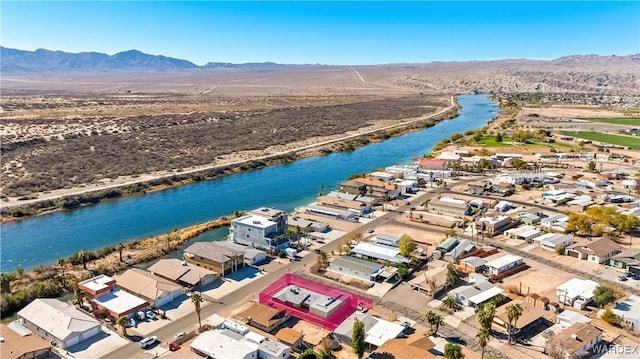 aerial view with a residential view and a water and mountain view