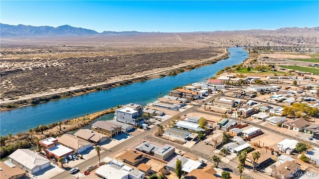 bird's eye view featuring a residential view and a water and mountain view