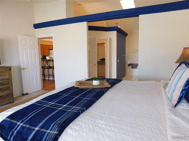 bedroom with a high ceiling