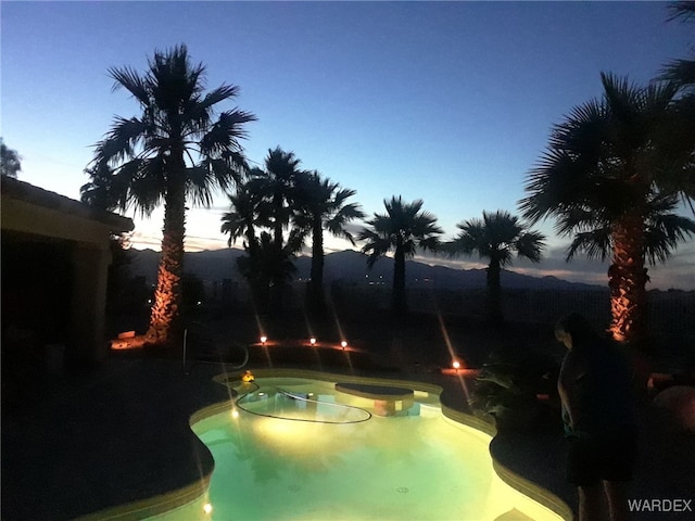 outdoor pool with a mountain view