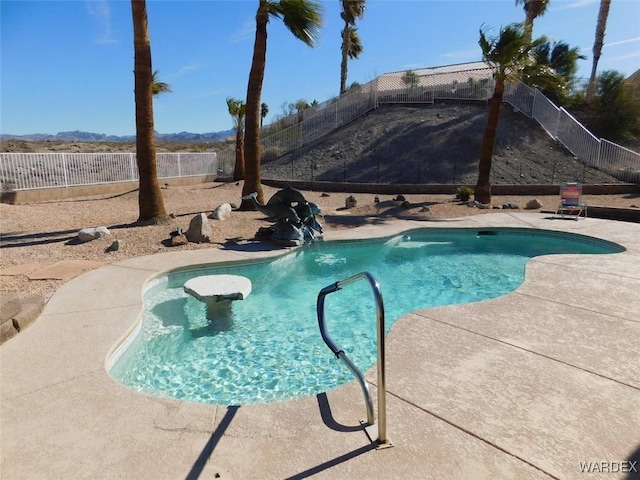 view of swimming pool featuring a fenced in pool, a patio area, and a fenced backyard