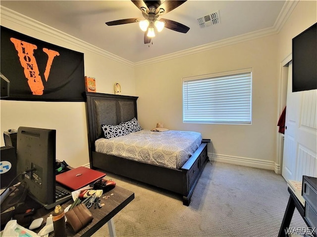 bedroom with baseboards, carpet, visible vents, and crown molding