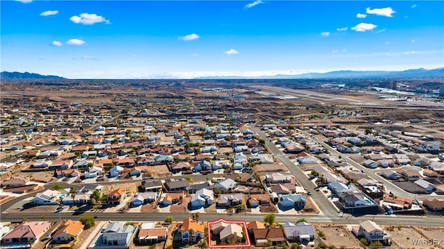 drone / aerial view with a residential view and a mountain view