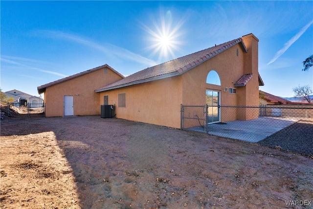 view of home's exterior featuring a patio area, fence, and stucco siding