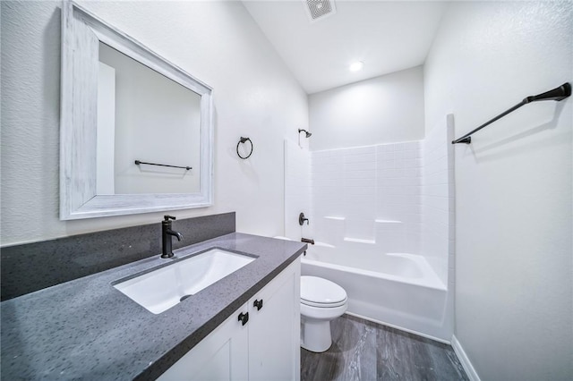 6102 S Scorpion Ln, Fort Mohave, AZ 86426 - full bath featuring wood finished floors, vanity, and shower / washtub combination